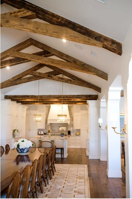 dining room with raised timber ceiling